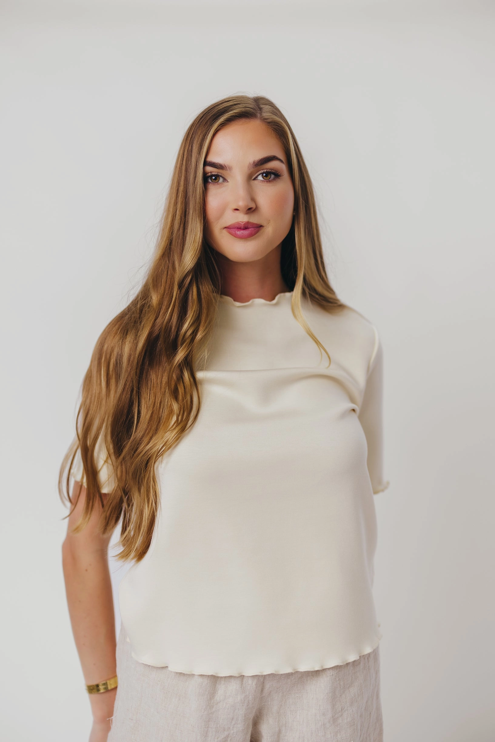 Adjustable Side Tabs Core Jemma Butter Modal Mockneck Top with Merrow Edge from P.Cill in Eggshell
